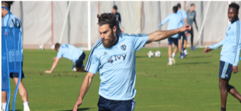 Graham Zusi lining up a strike on goal during a training session.